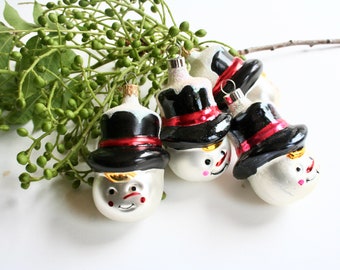 Vintage glass snowman Christmas ornaments. Box set, set of four, medium size, Mexico, silver tone, black, red, yellow, glitter, Bradford