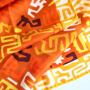Vintage Vera Neumann tribal inspired silk scarf.  1970s, retro, abstract, oblong, hand rolled, Japan, yellow, orange, caramel, white