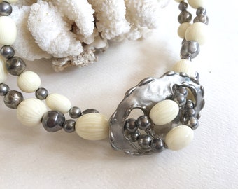 Vintage bohemian necklace. Boho, beaded, chunky, white variegated beads, silver tone metal, collar length, exotic, rustic, artisan made