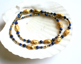 Vintage Egyptian revival scarab lapis lazuli necklace. Artisan, handmade, 24", blue stone, gold plate