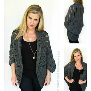 May include: A gray crochet cardigan with a lacy pattern. The cardigan has a draped neckline and three-quarter sleeves.