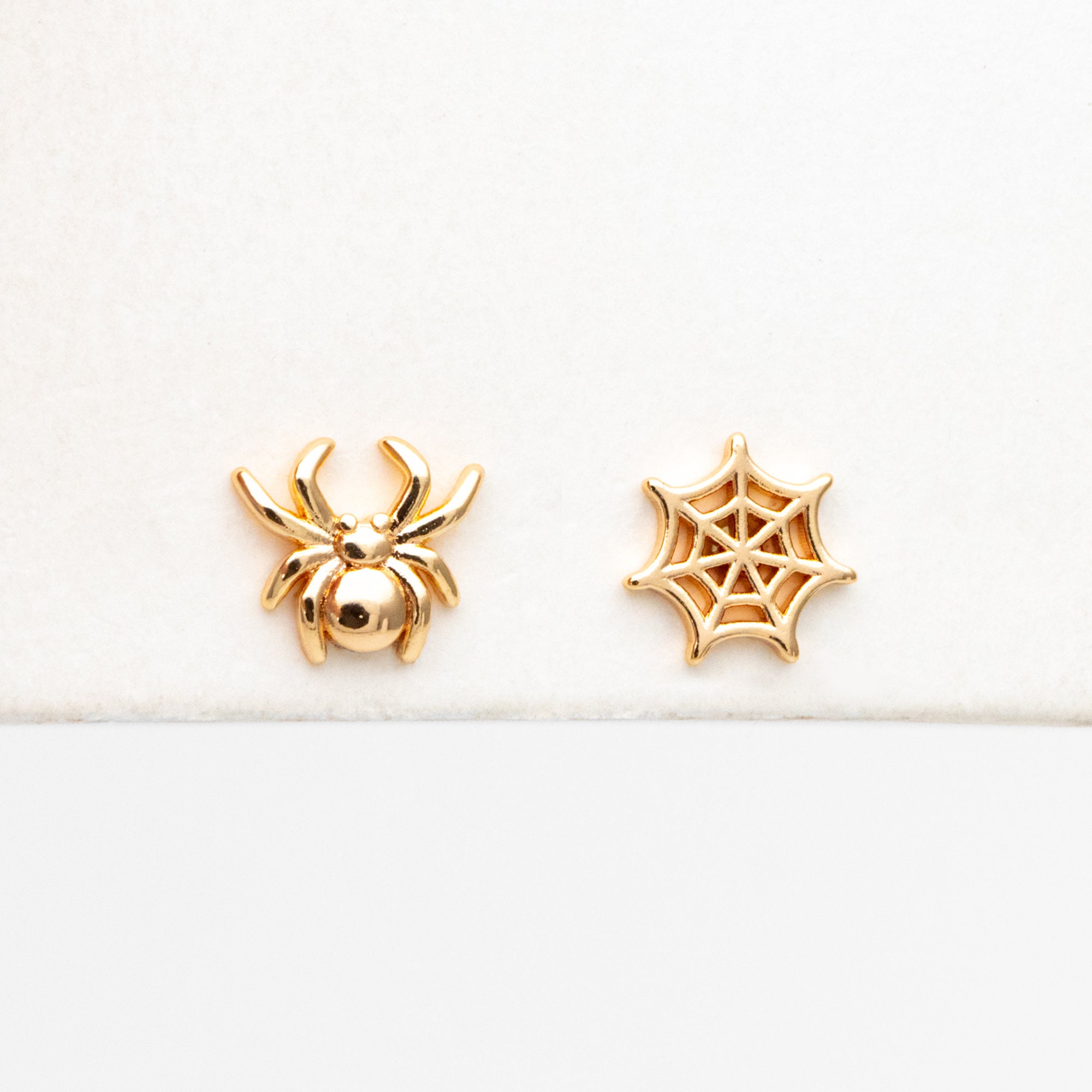 Gold spider earrings clearance