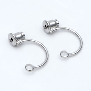 May include: Two silver-toned metal earring hooks with a small loop at the end of each hook. The hooks are designed to hold a charm or pendant.