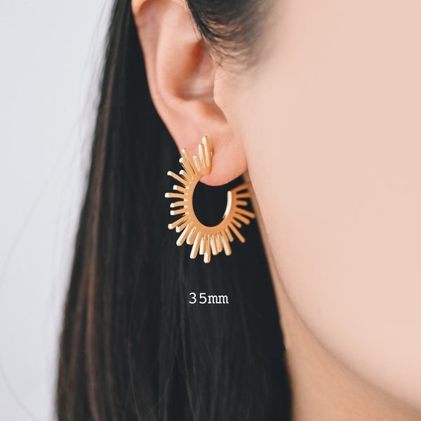Sun golden earrings