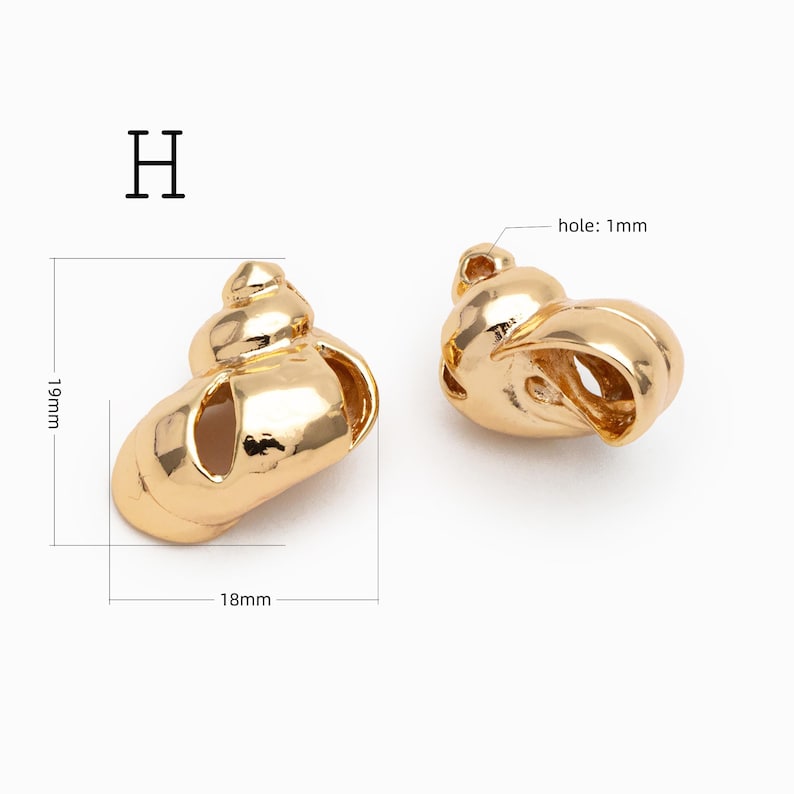 May include: Two gold-colored metal shell charms labeled H. The charms measure 19mm in height and 18mm in width, featuring a 1mm hole for attachment. The smooth, reflective surface mimics the spiral shape of a seashell in a polished finish.