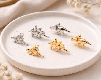 10 dijes de dinosaurio dorados y plateados para bisutería, materiales para manualidades (GB-2650)