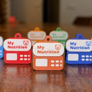 Enteral Feeding Pump Keychain 3D Print File Package | Educational Medical Roleplay Keychain | With Symbols