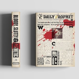 May include: A book and a newspaper with a vintage aesthetic. The book spine reads "BLOODY, SLUTTY & PATHETIC" in black and red. The newspaper, "DAILY PROPHET", features a headline with a quote and red splatters.