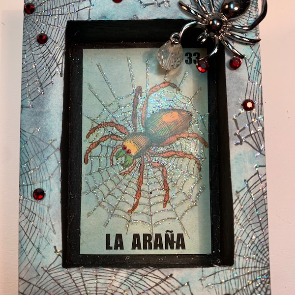 Small handmade spider shrine/shadowbox was from up-cycled materials, wood box, vintage papers, metal findings, and glass rhinestones.