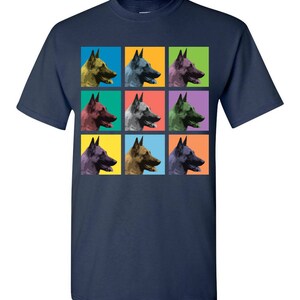 May include: A navy blue t-shirt with a pop art design featuring nine images of a Belgian Malinois dog's head in different colored squares.