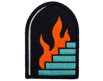 May include: Embroidered patch featuring a black arched background with a white border. Inside, orange flames rise above a teal staircase design. The patch is a unique accessory.