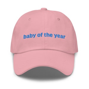 Baby des Jahres Mütze. Ich denke, Mütze sollte man stehen lassen. Ich bin Baby Papa Mütze.