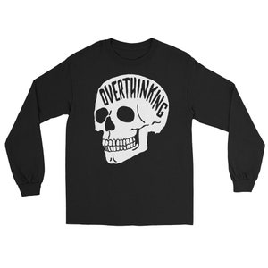 May include: Black long-sleeve shirt with a white skull graphic and the text "Overthinking King" on the skull.
