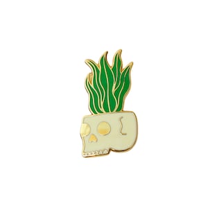Skull plant enamel pin. Snake plant lapel pin.