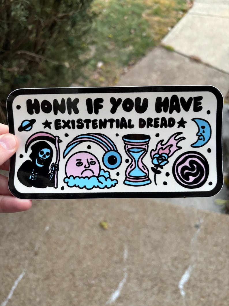 May include: A white sticker with black outlines and colorful illustrations. The sticker says "Honk if you have *Existential Dread*" and features a grim reaper, a sad face in a cloud, an eye, an hourglass, a flame, and a swirl.