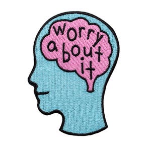 May include: A blue outline of a head with a pink brain inside. The brain has the text "worry about it" written on it.
