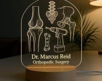 Veilleuse personnalisée pour chirurgien orthopédiste, cadeau personnalisé avec motif gravé au laser et socle en bois à LED