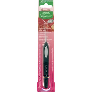 May include: A black and gray thread pic tool with a comfortable grip and ergonomic handle. The tool is labeled "Soft Touch Thread Pic" and "Clover Art No. 4910".
