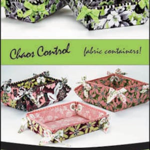 May include: A sewing pattern for a fabric storage container called "Tie-dy Up!" by Vanilla House Designs. The pattern includes instructions for making a square container with a tie closure. The pattern is labeled "Chaos Control fabric containers!" and "P192".