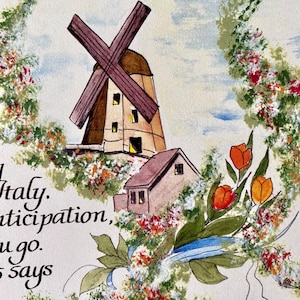 May include: A watercolor painting of a windmill and a small house with a red roof. The windmill has a brown wooden frame and a white sail. The house has a brown wooden frame and a white door. The painting is surrounded by a border of green leaves and red flowers.
