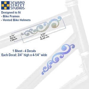 May include: Four iridescent blue and white glitter decals with a swirling design. Each decal is 3/4 inch high by 4-1/4 inches wide. The decals are designed to fit bike frames and vented bike helmets.