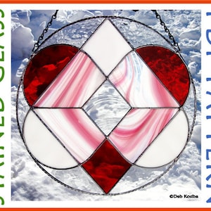 May include: A stained glass pattern for a heart-shaped window, featuring red, white, and pink glass pieces. The pattern is in a circle and has a diamond shape in the center. The pattern is called "PDF Pattern" and is by Deb Kostiba.