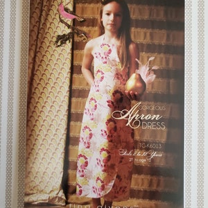 Tina Givens Girls Sewing Pattern Gorgeous Apron Dress TG-K6013 2T to 11-12