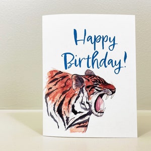 Happy Birthday roars the tiger. Give someone a surprise and a good laugh with this tiger birthday card. image 1