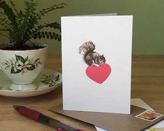 Squirrel love card for new baby, anniversary, or any occasion. Funny small card with a squirrel on a heart. Blank inside.