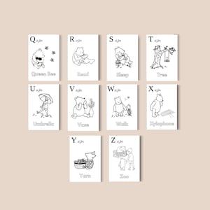 May include: Black and white illustrations of Winnie the Pooh characters with the alphabet. Each card features a letter and a corresponding word: Queen Bee, Read, Sleep, Tree, Umbrella, Vase, Walk, Xylophone, Yarn, and Zoo.
