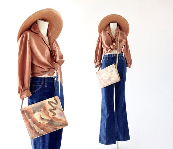 painted leather cross body bag