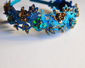 Peacock and teal blue beaded sequin beaded headband on a satin headband. Available in blush and dark red burgundy. OAK