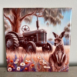 May include: A vintage green tractor with a brown kangaroo sitting in a field of wildflowers. The tractor has a large front tyre and a smaller back tyre. The kangaroo is sitting upright with its paws in front of it.