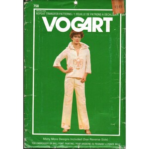 May include: A green Vogart iron-on repeat transfer pattern envelope, number 758, featuring a white shirt and pants set with an orange eagle design. The packaging includes text for embroidery or ball point painting and notes more designs inside.