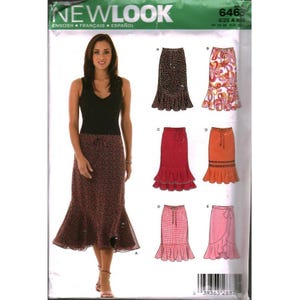 May include: New Look sewing pattern 6463 for skirts. The envelope displays a model wearing a dark, patterned, calf-length skirt with a flared hem and drawstring waist. Illustrations show five additional skirt variations in different colors and patterns.