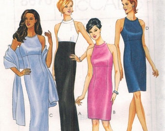 May include: A sewing pattern for four different styles of sleeveless dresses. The pattern is for a petite-able cut-to-fit design. The dresses are shown in blue, black, pink, and white.