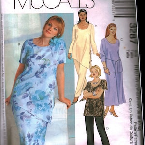 May include: A sewing pattern for a dress and pants. The pattern includes four different styles. The dress is a floral print with a blue and white color scheme. The pants are a solid color in black, beige, and purple. The pattern is called "Womanstyle" and is from McCall's.