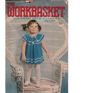 May include: The Workbasket and Home Arts Magazine August 1974 cover features a child wearing a blue crocheted dress with white trim and pom-poms. The child is standing in a white wicker chair. The magazine title is printed in large red letters.