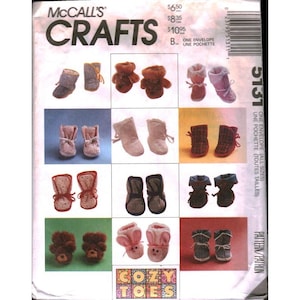 May include: A McCall's Crafts pattern envelope featuring various baby booties. The booties are in different styles and colors, including teddy bear, bunny, and plaid designs. The text "COZY TOES" is at the bottom. The envelope also includes pricing information.