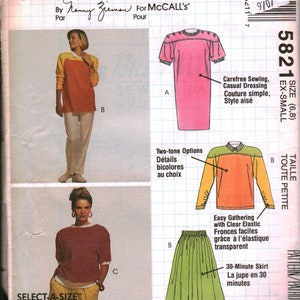 Op de afbeelding: Naai-patroon voor een jurk en een rok. Het patroon is voor maten 6 en 8. De jurk is roze met witte knopen en de rok is groen. Het patroon heet "Busy Woman's" en is van Ramey Zieman voor McCall's.