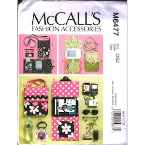 May include: McCall's M6477 fashion accessories sewing pattern envelope featuring illustrations of various small crossbody bags, wallets, and pouches in polka dot and floral patterns, along with images of accessories like sunglasses, a water bottle, and a phone.
