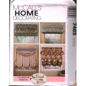 May include: A McCall's Home Decorating sewing pattern envelope, number 7485, featuring four distinct window valance designs. The images display gathered, pleated, and scalloped fabric window treatments in various floral and striped patterns.