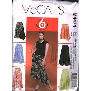 May include: A McCall's M4474 sewing pattern envelope featuring illustrations of six different skirt styles. The pattern includes options for various lengths and prints, including floral, paisley, and solid fabrics, with size range KK (26W-32W).