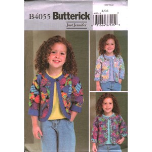 May include: A Butterick sewing pattern B4055 featuring a young girl wearing a colorful patchwork jacket. The jacket has a blue trim and button closure. The pattern includes multiple views of the jacket. The text "Just Jennifer" is also visible.