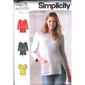 May include: Simplicity sewing pattern S9275 for a top with long or short sleeves, a round neckline, and a front pocket. The pattern includes sizes U.S. 16-24. The package displays illustrations of three variations in red, dark gray, and yellow.