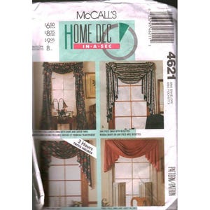 May include: McCall's Home Dec In-A-Sec pattern 4621 for window treatments. The envelope displays three different curtain styles: a floral swag with bows, a swag with rosettes, and a solid-coloured draped valance, all shown over window frames.