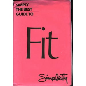 May include: A rectangular book cover with a bright pink background. The text at the top reads SIMPLY THE BEST GUIDE TO in black, followed by the large black word Fit in the center. The word Simplicity is printed in black script at the bottom.