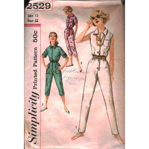 May include: Vintage Simplicity sewing pattern 2529. The pattern features illustrations of three different jumpsuits. The pattern includes the size 12 and bust 32 measurements. The pattern is printed and costs 50 cents.