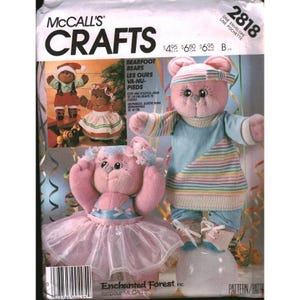 May include: A McCall's Crafts 2818 sewing pattern envelope featuring illustrations of stuffed bear dolls. One bear wears a pink tutu and blue top, while another wears a striped shirt and pants. The text includes Bearfoot Bears and Enchanted Forest.