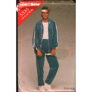 May include: A vintage sewing pattern package featuring a teal tracksuit with white stripes and a tennis racket. The package has the text "Bee & Sew" and "5335" with size information. The model is wearing a white headband and white sneakers.